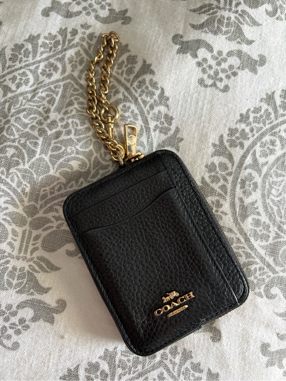 Coach Black Pebbled Leather Card Holder with Gold Chain Accent